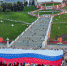 Российский флаг площадью 1500 квадратных метров развернули у катера «Герой» в Нижнем Новгороде - Единая Россия