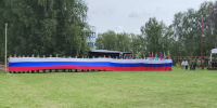Нижегородские парашютисты и волонтеры развернули в небе государственный флаг России - Правительство Нижегородской области